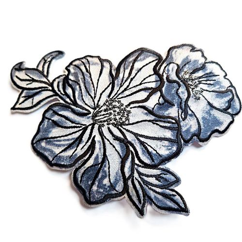 Strykemerke grå og sort blomst 